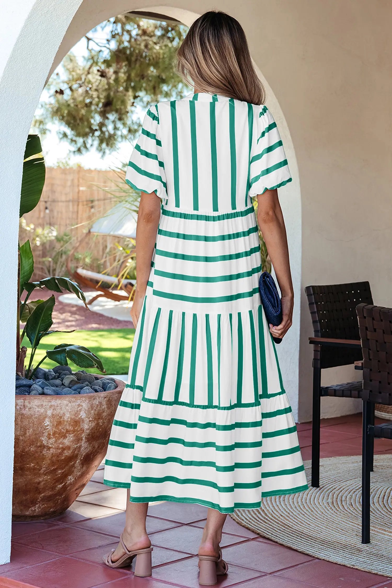 Green stripe empire waist midi dress showing ricrac trim at neckline and sleeve edges, side view, Fashionfitz