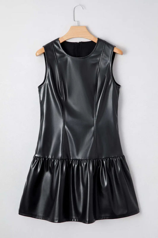 Ladies Black Faux Leather Mini Dress | FashionFitz displayed on hanger showing structured bodice and ruffled mini skirt design.