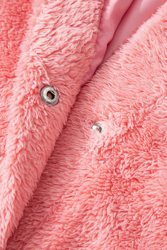 Texture shot of soft synthetic fleece in varsity pink tone