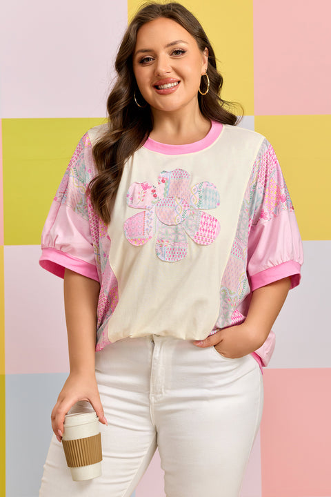 Woman wearing floral patchwork embroidered short sleeve cotton plus size T-shirt