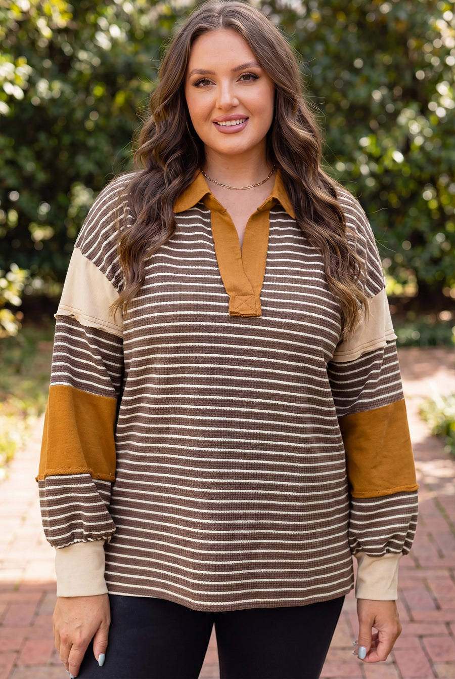 Brown stripe colorblock plus size top — side view showing collar detail