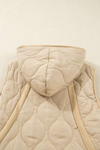 Back detail of khaki Quilted Fleece‑Lined Winter Gilet highlighting hood, quilted texture, and ribbed trim accents.