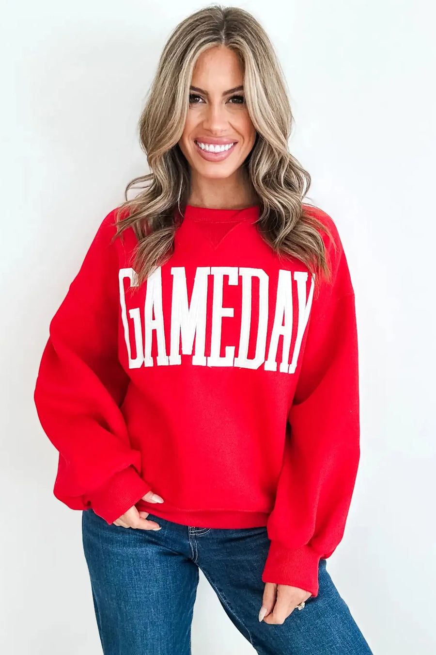 GAMEDAY embroidered patch sweatshirt — styled with jeans and trainers