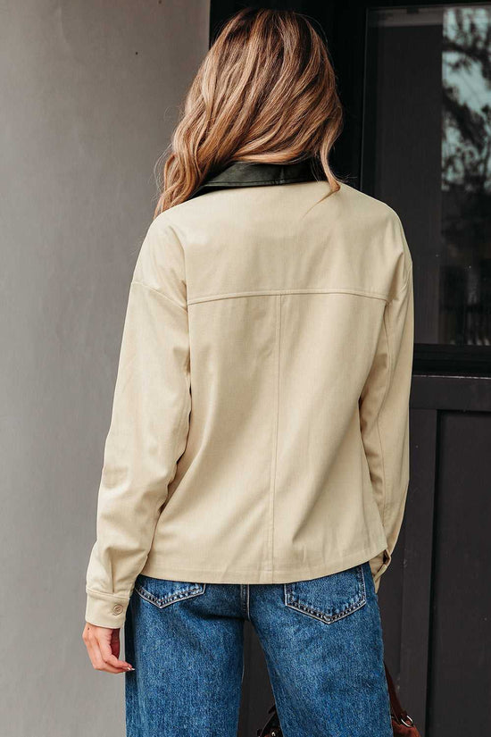Rear view of Leather Collar Corduroy Jacket on model, emphasizing clean lines and comfortable fit for daily wear.