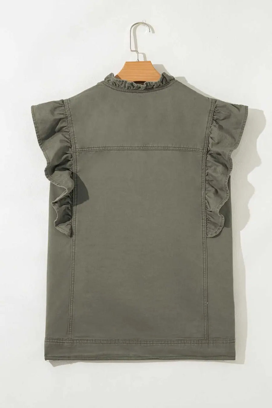 Back flat view of Green Bay Ruffled Denim Vest - Women's Fashion Trends displaying clean lines and ruffled sleeve detailing in solid green denim.