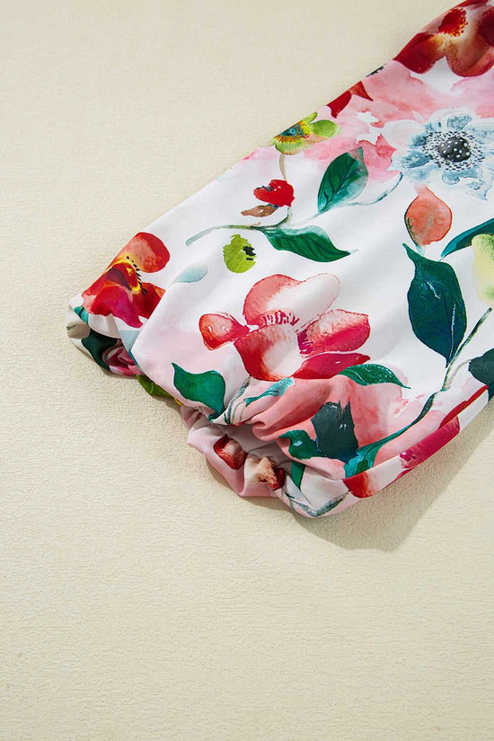 Sleeve detail of Floral Shift Dress - Casual Elegance showing elastic cuff and colorful floral pattern for a feminine finish.