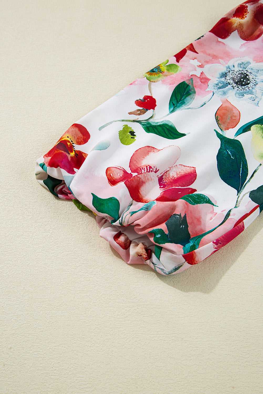 Sleeve detail of Floral Shift Dress - Casual Elegance showing elastic cuff and colorful floral pattern for a feminine finish.