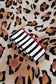 Women’s khaki leopard print colorblock lounge set — long‑sleeve relaxed top with wide‑leg pants detail.