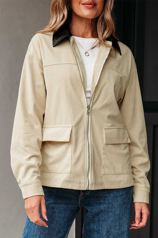 Close-up of front of Leather Collar Corduroy Jacket, highlighting zip closure and structured patch pockets for a casual look.