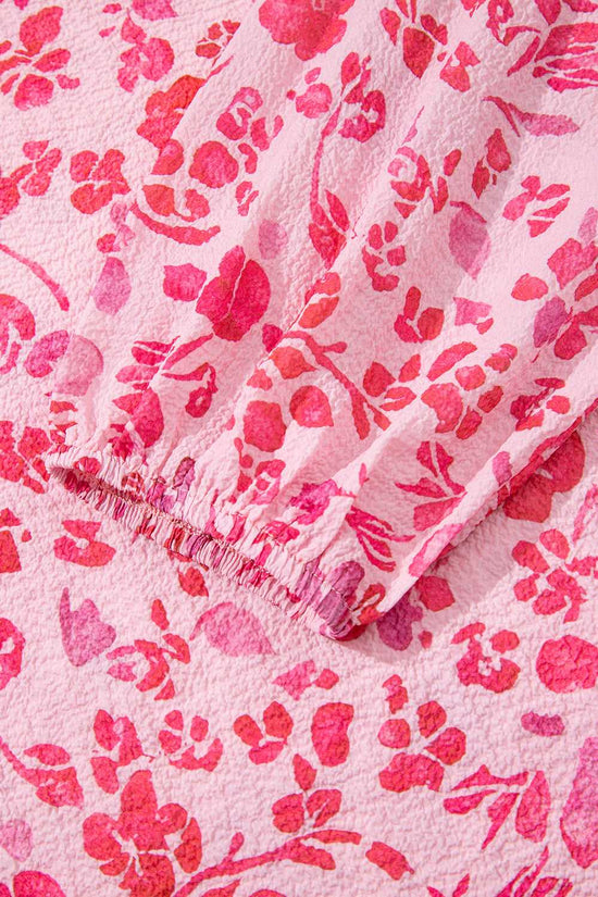 Elastic cuff detail on Pink Floral Lightweight Blouse sleeve, showcasing the delicate floral print and textured fabric.