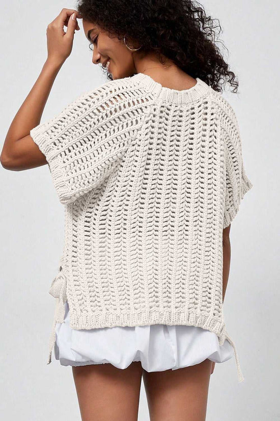Back view of cream Plus Size Bow Tie Open‑Knit Jumper for Women showing relaxed fit and open-knit pattern.