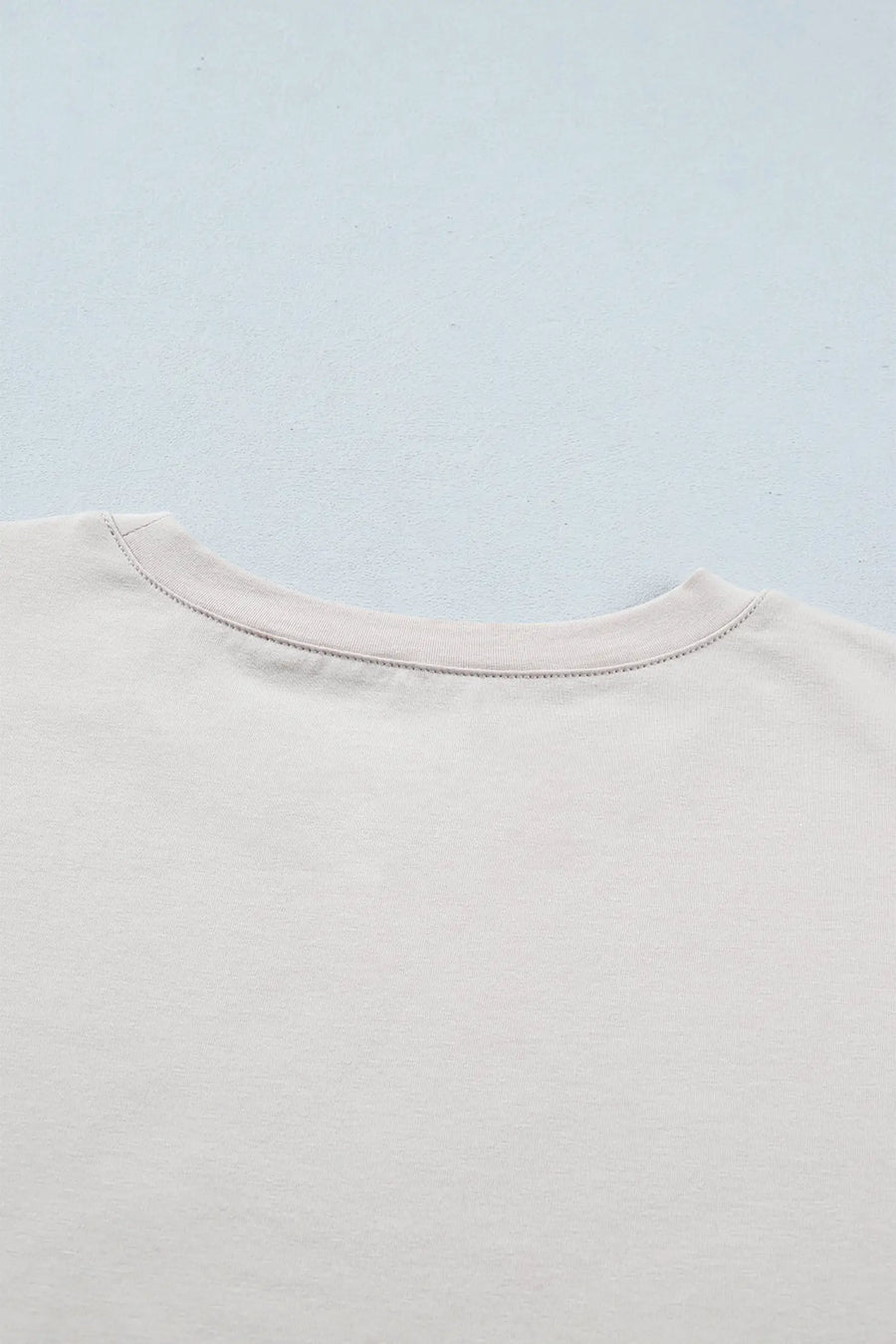 Women's cowgirl ruffle hem patchwork tshirt close-up detail