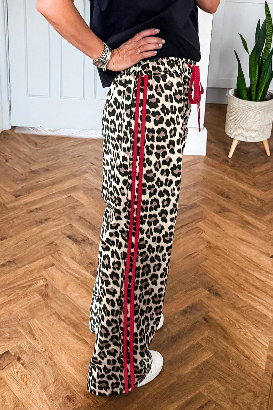 Side Stripe Leopard Wide Leg Trousers UK — close-up detail showing leopard print and contrast side stripe — Fashionfitz