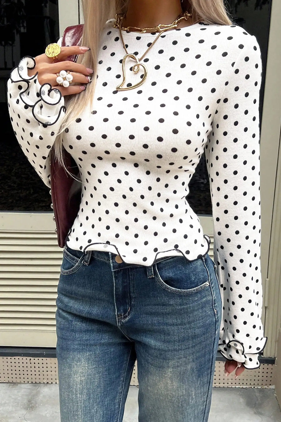 Black Polka Dot Print Lettuce Trim Long Sleeve Top — fabric texture detail | Fashionfitz UK