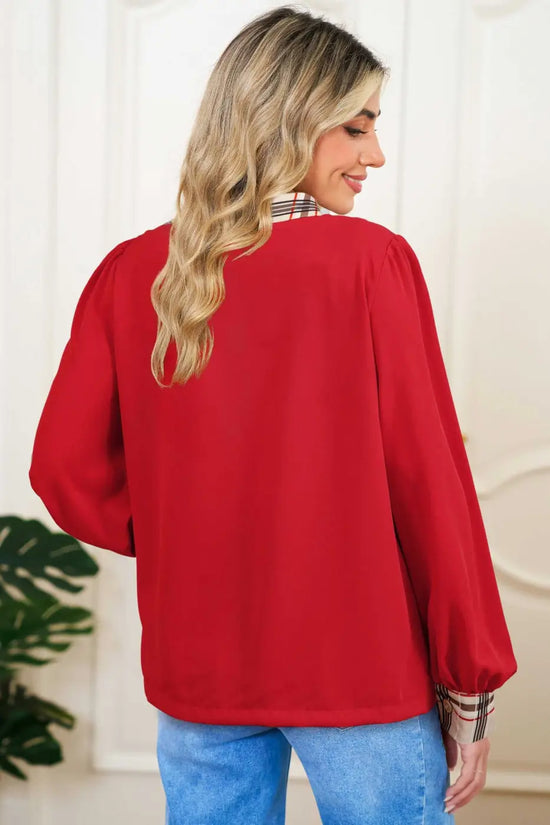 Back view of Red Tartan Fusion V‑Neck Blouse showing solid red fabric and relaxed fit, perfect for everyday wear.