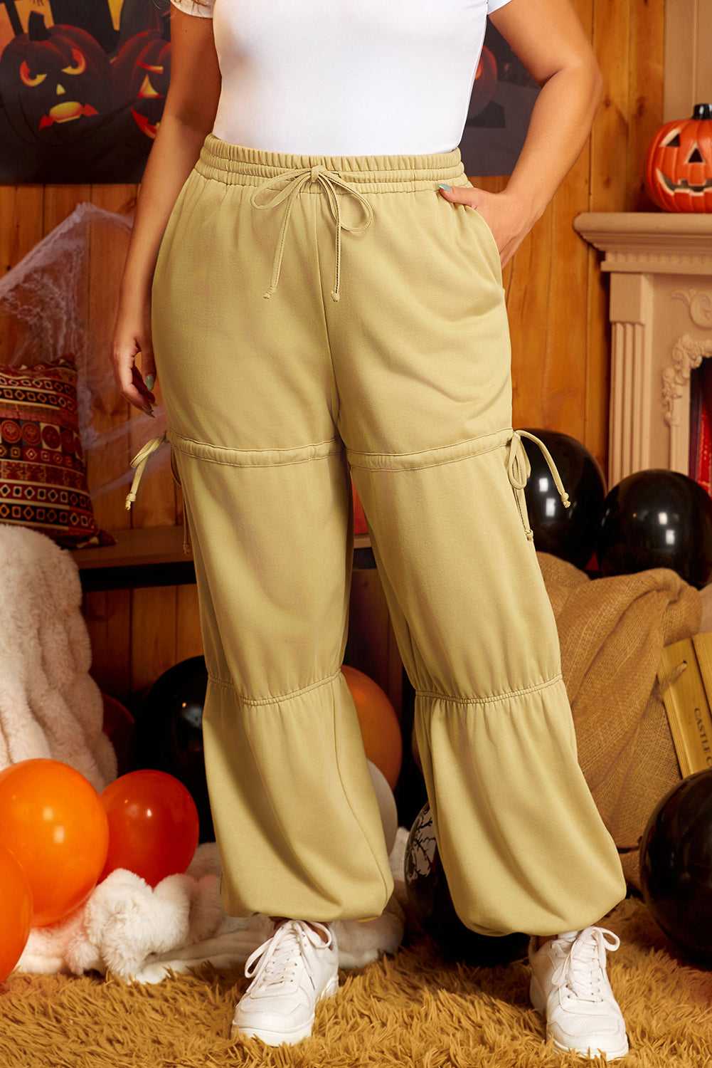 Full front view of plus size beige Terry Knit Sweatpants featuring drawstring waist and tiered leg design, styled for everyday wear.