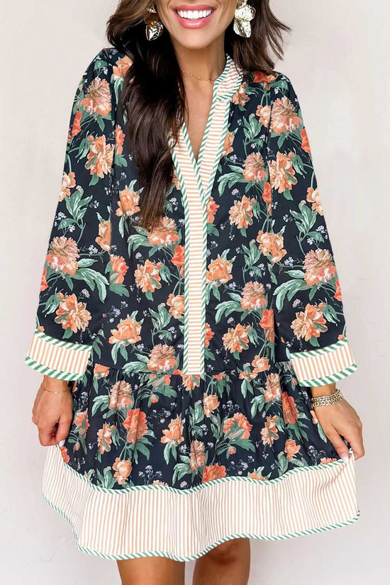 Front close-up of Ladies Blue Floral Shift Mini Dress with orange floral pattern and striped trim, blending feminine and Southern Belle aesthetics.