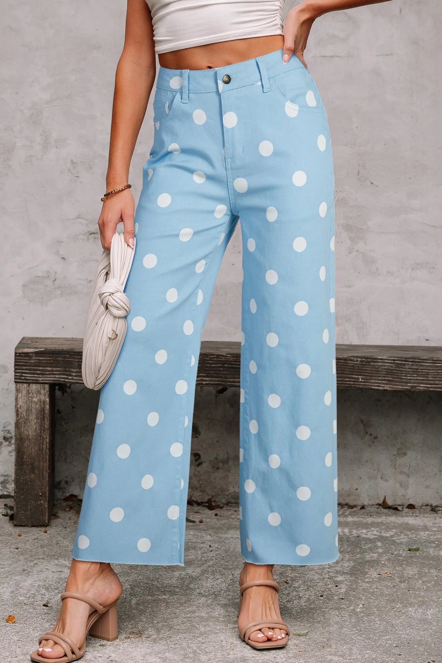 Woman wearing sky blue polka dot raw hem straight jeans high waisted front view Fashionfitz UK