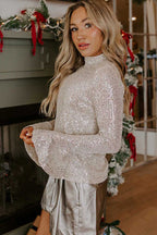 Bell sleeve evening blouse in silver sequin with high neckline, ideal for night out or holiday party looks in fall and autumn.