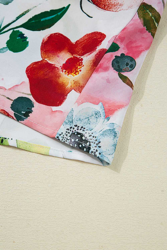 Hemline detail of Floral Shift Dress with neat stitching and multicolor floral print, ideal for summer wear.