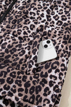 Leopard Print Quilted Puffer Gilet with phone in front pocket. Functional zip-up vest with secure storage for daily use.