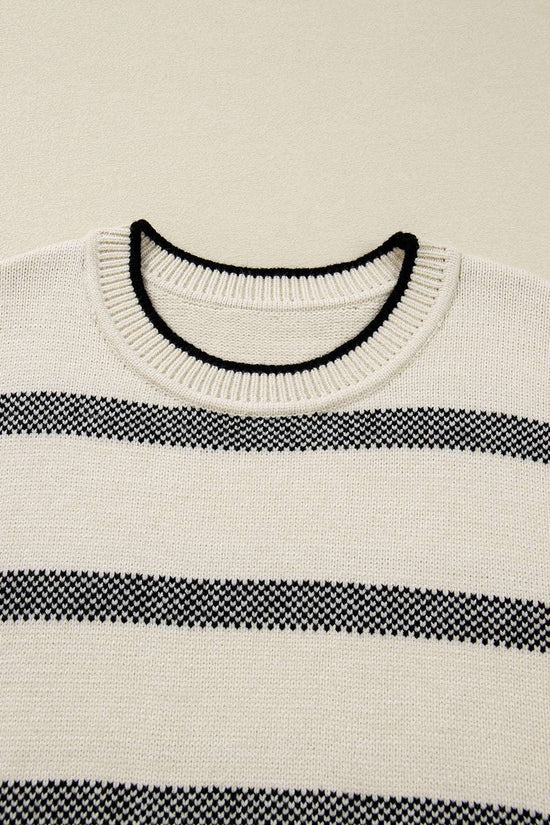 Close-up of neckline on Women's Apricot Striped Bell Sleeve Jumper, featuring ribbed collar with black trim. Highlights quality knitwear details.