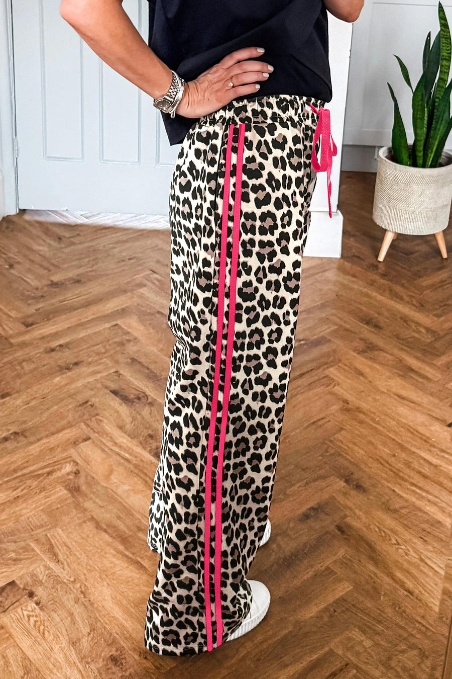 Leopard Wide Leg Trousers Women UK in Red — front view showing red leopard print with side stripe — Fashionfitz