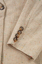 Sleeve detail of Ladies Light Beige Fitted Blazer - Casual Smart Office | FashionFitz with four-button cuff and multicolor speckled fabric.