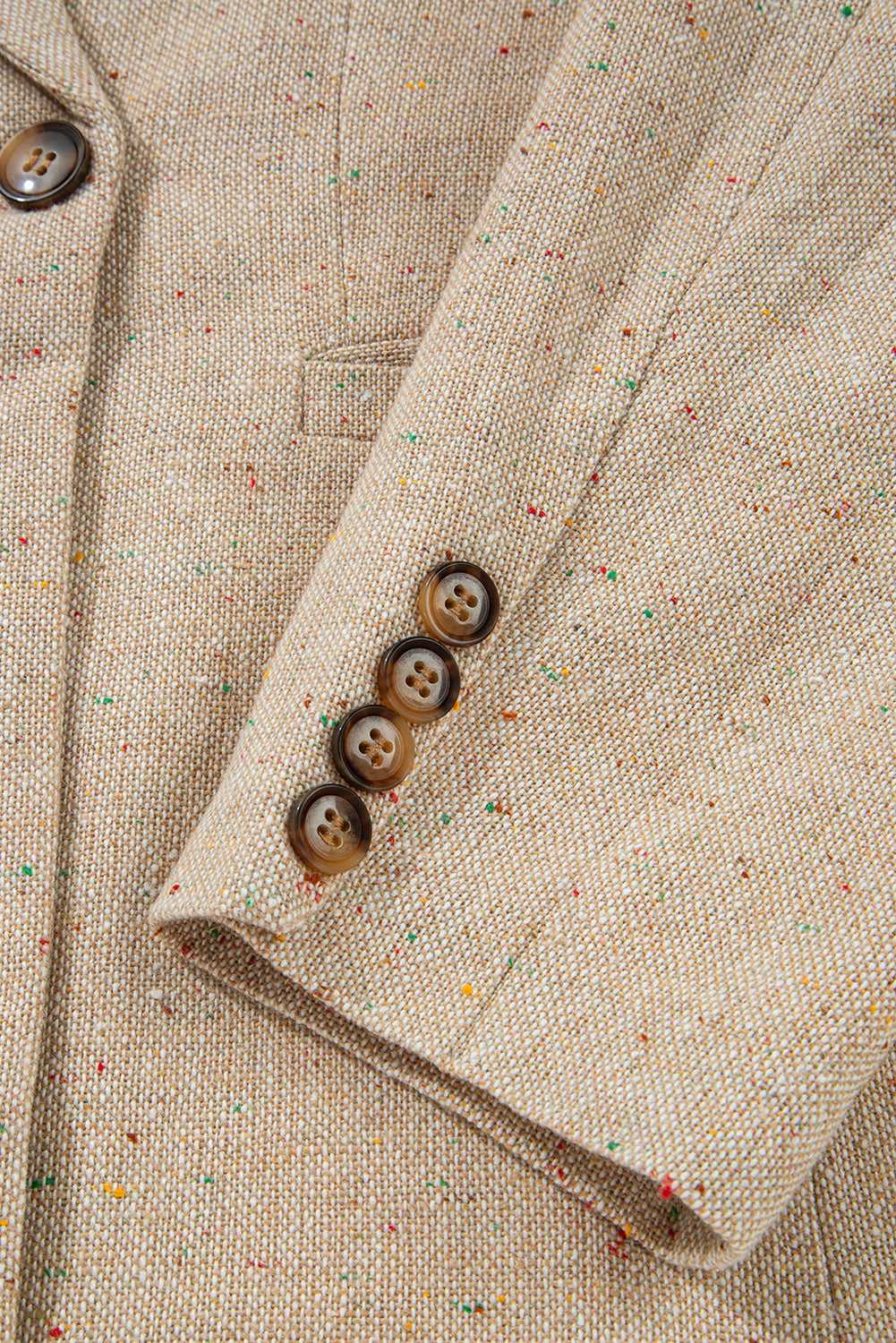 Sleeve detail of Ladies Light Beige Fitted Blazer - Casual Smart Office | FashionFitz with four-button cuff and multicolor speckled fabric.
