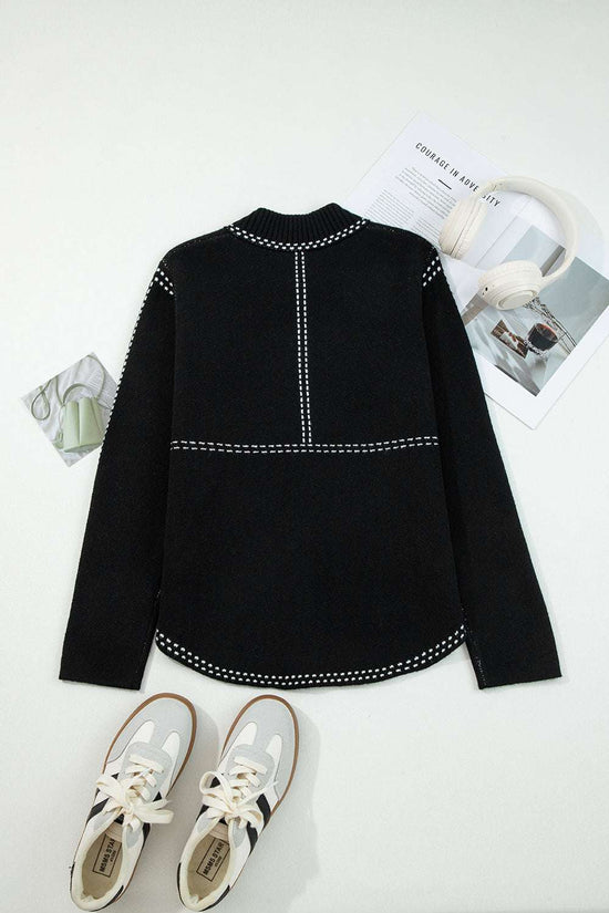 Back flat lay of Women's Black Contrast Trim Knitted Cardigan showing clean lines and contrast stitching, paired with casual sneakers.