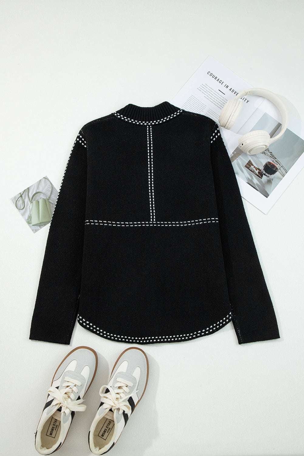 Back flat lay of Women's Black Contrast Trim Knitted Cardigan showing clean lines and contrast stitching, paired with casual sneakers.