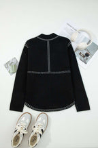 Back flat lay of Women's Black Contrast Trim Knitted Cardigan showing clean lines and contrast stitching, paired with casual sneakers.
