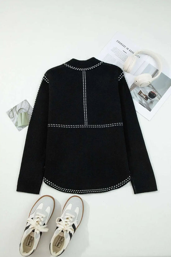 Back flat lay of Women's Black Contrast Trim Knitted Cardigan showing clean lines and contrast stitching, paired with casual sneakers.