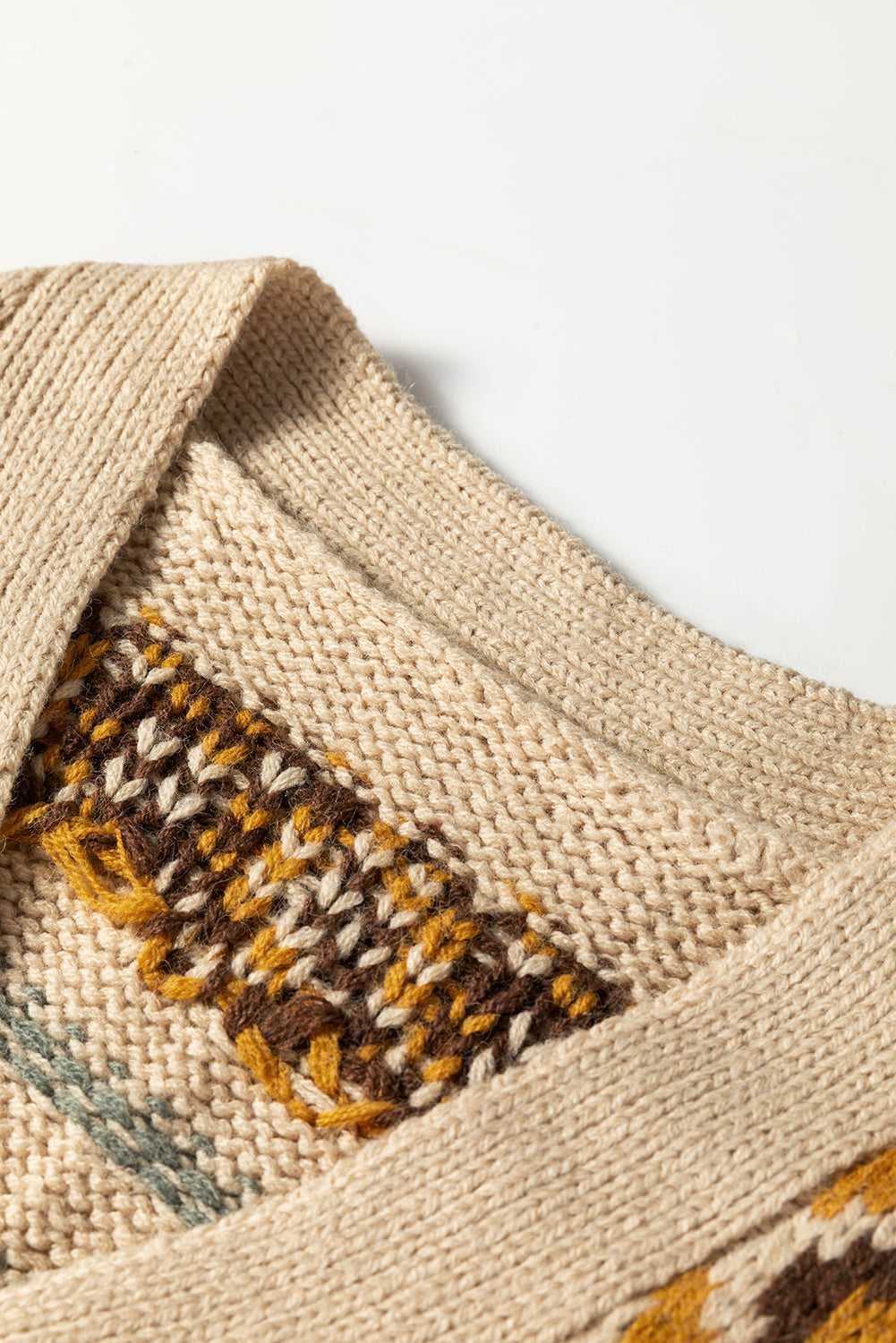 Close-up of neckline on Women's Khaki Western Pattern Knit Cardigan showing detailed knit and inner pattern. Soft and warm texture.