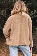 Back view of women’s plush fleece jacket in camel color, showcasing soft sherpa texture and relaxed fit for casual outerwear styling.