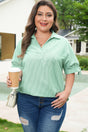 Woman wearing striped print collar V neck short sleeve plus size blouse