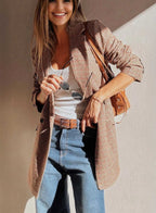 Close-up of Ladies Brown Houndstooth Fitted Blazer styled with a white tank and brown belt, ideal for modern fall fashion.