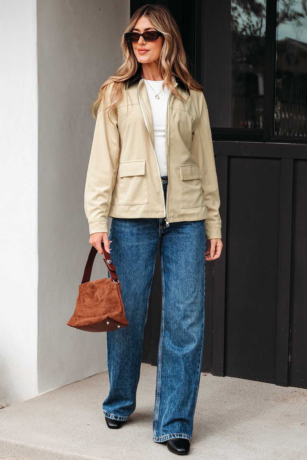 Full body view of model in Leather Collar Corduroy Jacket with wide-leg jeans and brown handbag, styled for casual autumn outings.