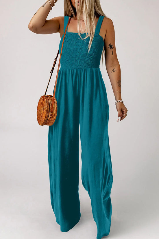 Peacock blue smocked square neck sleeveless jumpsuit with pockets