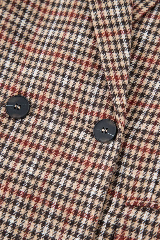 Detail of black buttons on Ladies Brown Houndstooth Fitted Blazer, showcasing double-breasted closure and classic design.