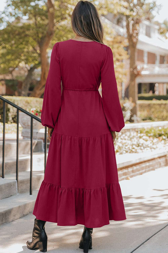 Back view of Ladies Burgundy Long Sleeve Tiered Maxi Dress showcasing tiered layers and cinched waist, ideal for autumn occasions.