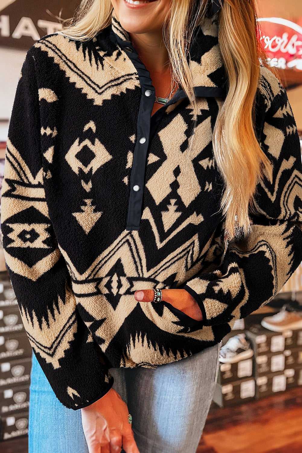 Half zip sherpa jumper in black with tribal pattern
