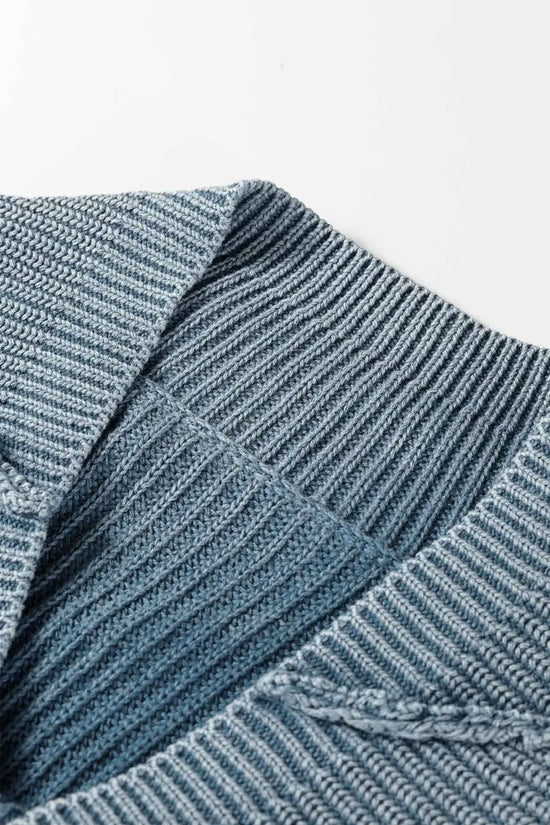 Close-up of collar and neckline on blue Women's Stonewash Patchwork Knit Open Cardigan, displaying ribbed texture and stitching.