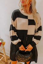 Close-up of Monochrome Knit Dress - Cozy & Stylish | FashionFitz showing textured knit fabric and ribbed cuffs for a cozy casual vibe.