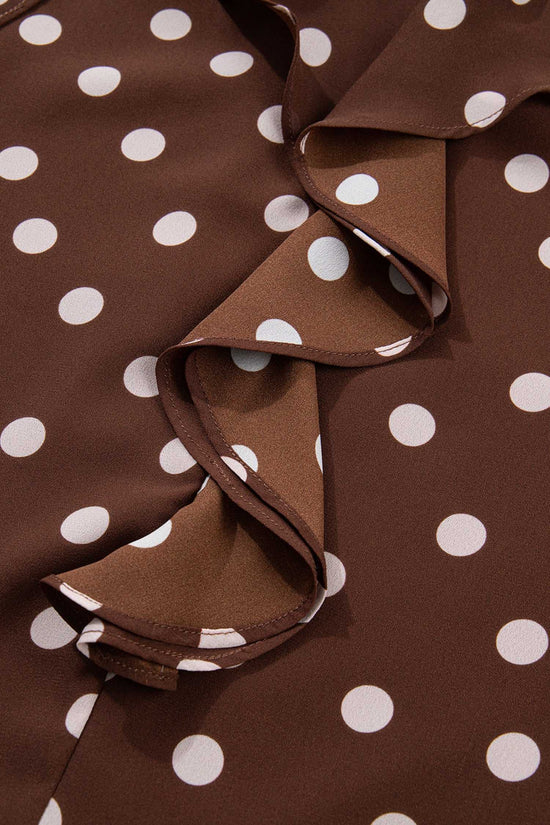 Zoomed-in view of the ruffled front design on the coffee polka dot chiffon blouse, highlighting the soft texture and elegant polka dot print.