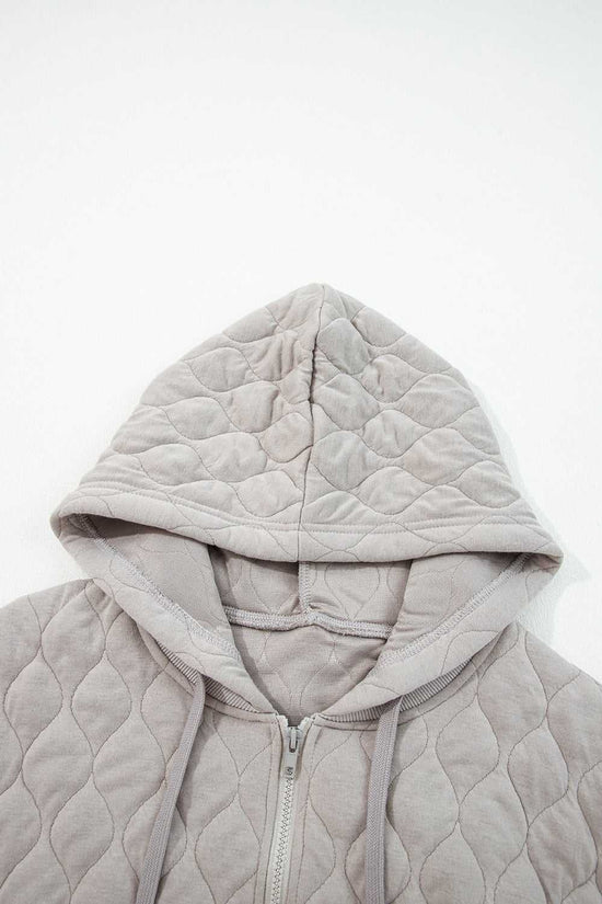 Top view of hood on curve grey quilted quarter-zip hoodie, showcasing soft quilted fabric and relaxed fit for plus size women.