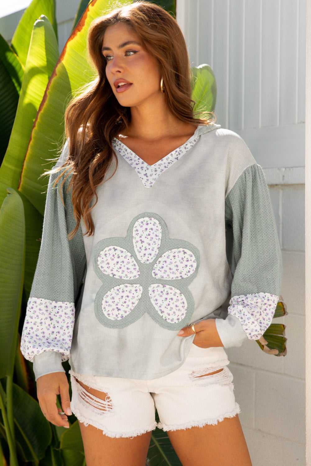 Floral Applique Oversize Hoodie | Women’s Green Waffle Knit with V-neck, floral patchwork design, and relaxed fit, styled for fall fashion.