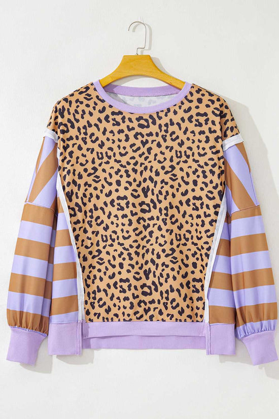 Flat lay of Curve Leopard Stripe Baggy Sweatshirt in lavender, showcasing leopard print body and striped sleeves for plus size fashion.