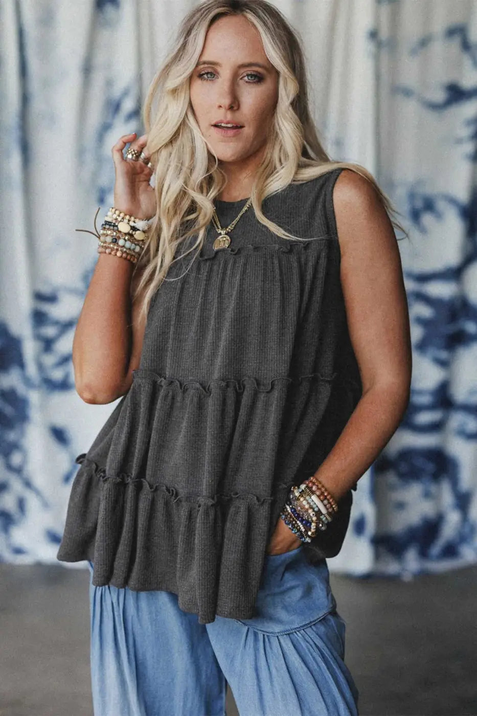 Front view of dark grey tiered frill tank top for women styled casually, ideal for summer wear with breezy comfort.
