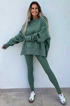 Smiling model in green Oversized Sweatshirt and Leggings Matching Set, showcasing the relaxed fit and cozy style for daily wear.